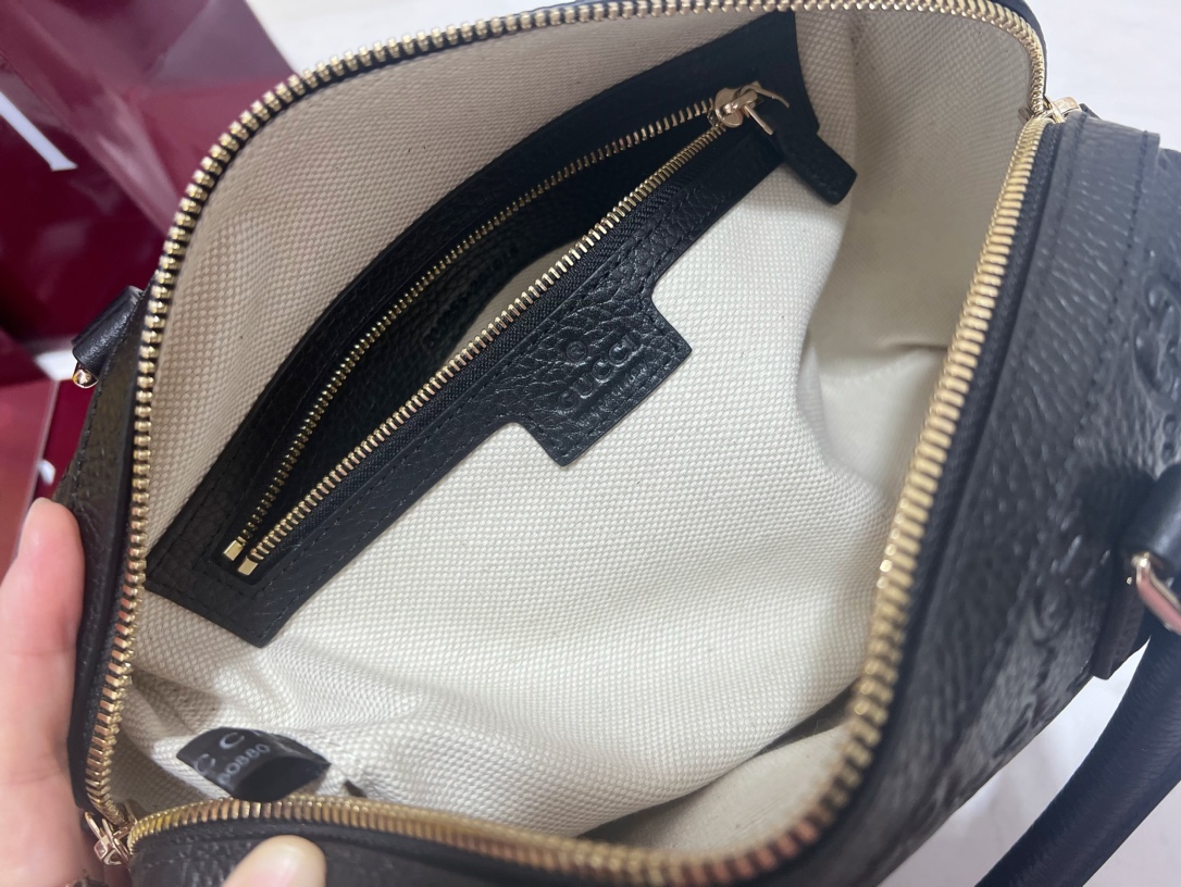 GUCCI  GG Emblem small top handle bag | 815255